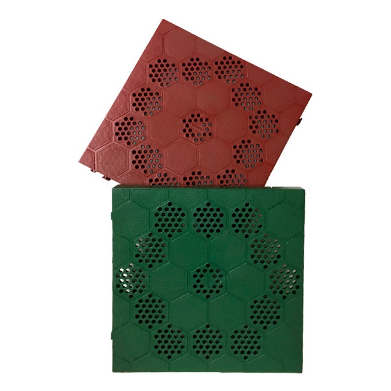Piastrelle in PVC ad incastro semiforata con motivo esagonale 40x40 cm Piastrelle in PVC ad incastro semiforata con motivo esagonale 40x40 cm